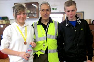 Junior run category winners Joe Downing and Hannah Downing with Race Director Tony French